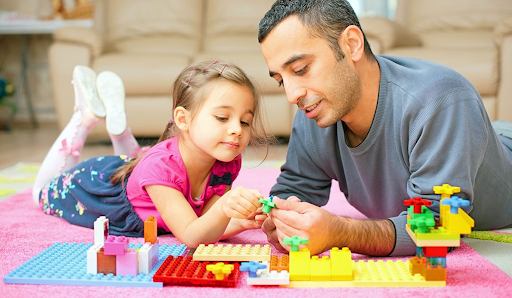 Family playing with blocks